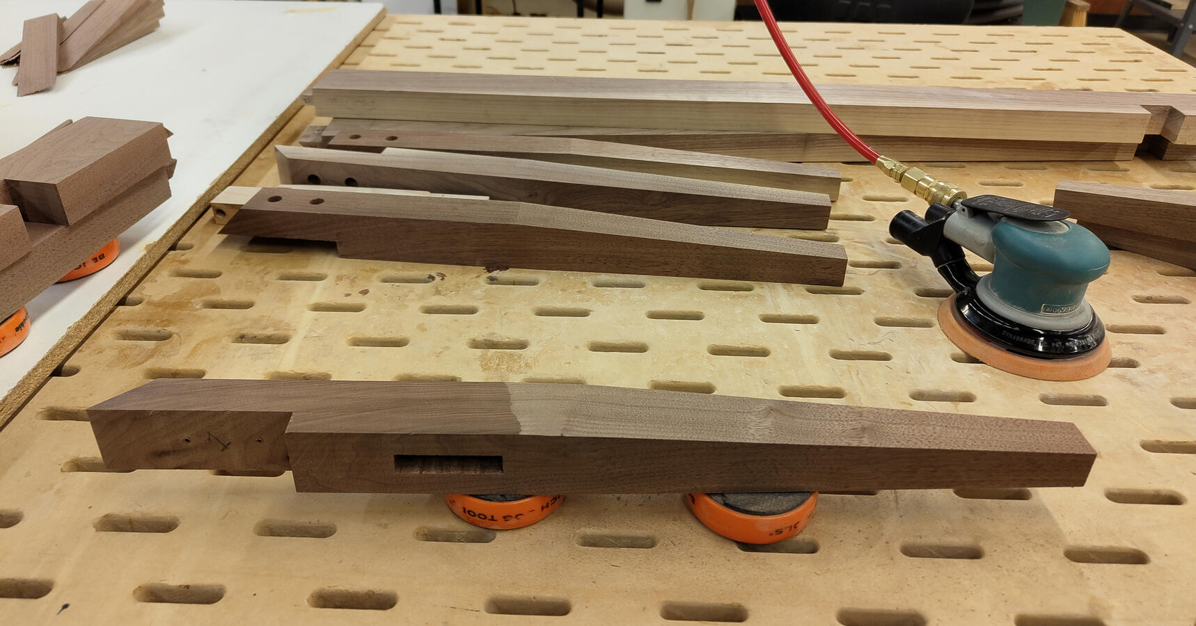 Tête-à-tête - Winter 2024. Sanding legs and aprons before assembly.